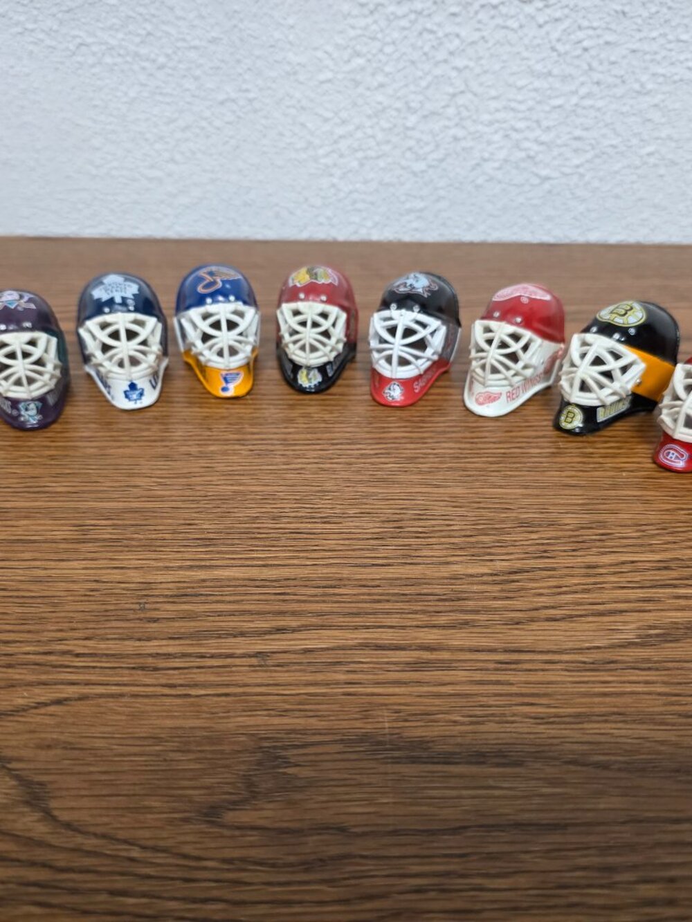 Vintage and Collectible Miniature Rubber NHL Hockey Goalie 2" Helmets Lot of 8
